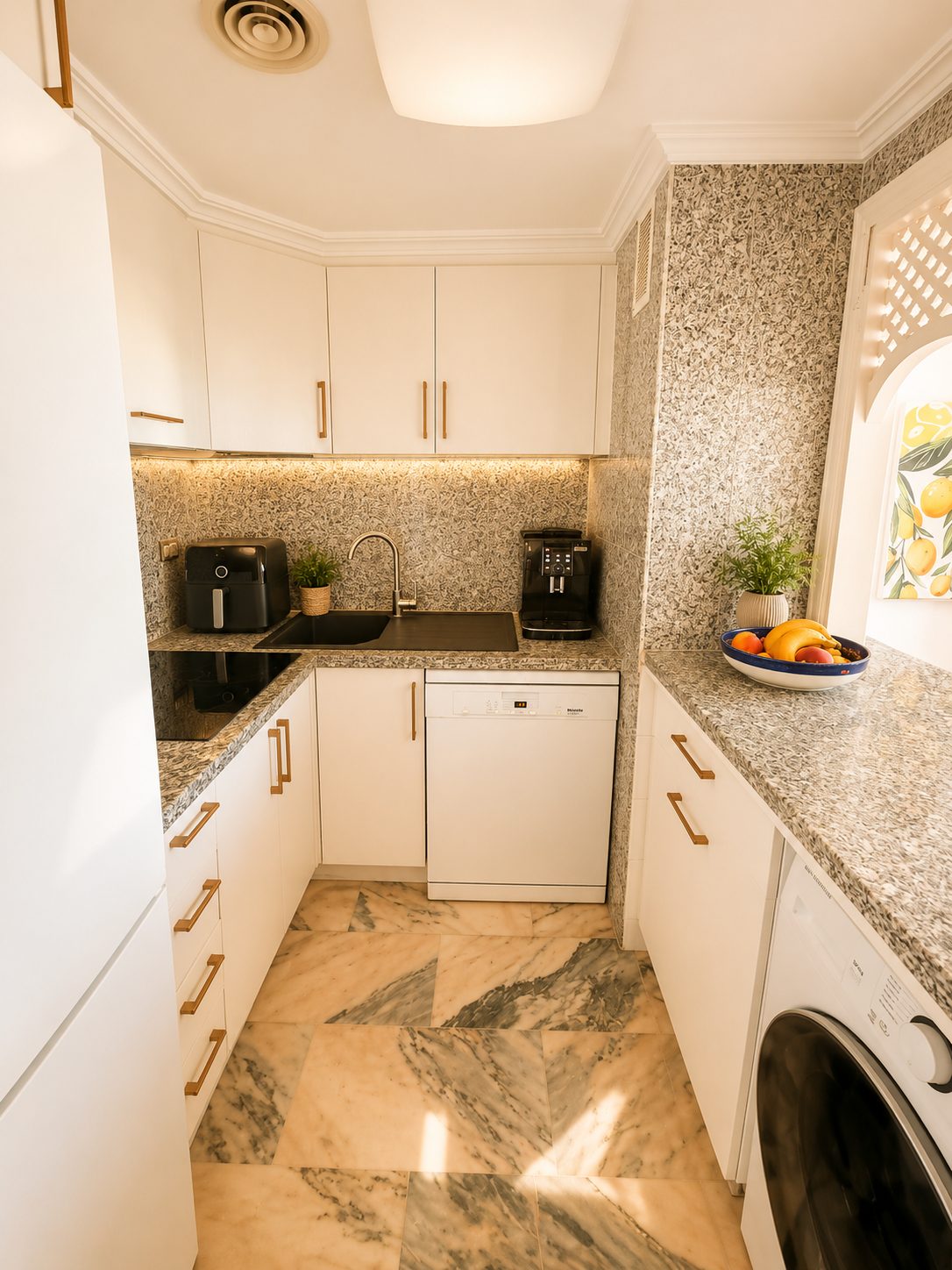 Fully equipped kitchen with dishwasher and coffee machine