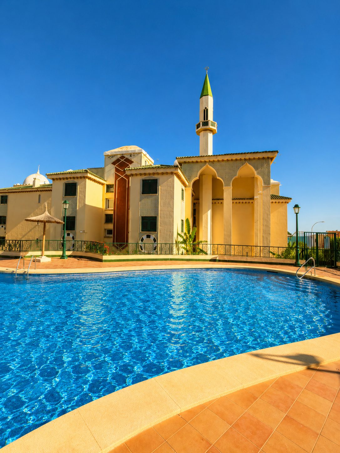 Pool by the residence minaret