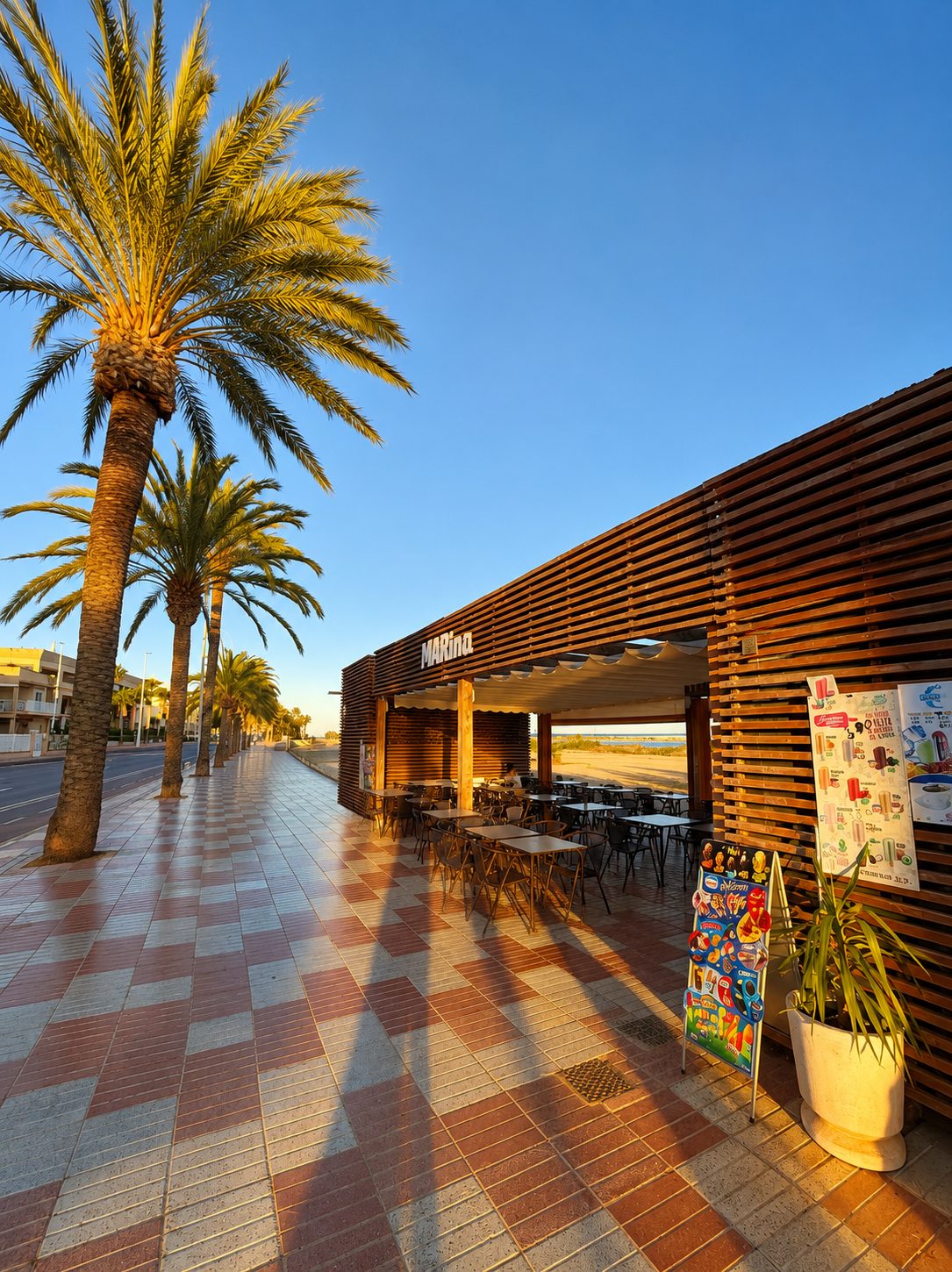 Seafront promenade with a beach bar